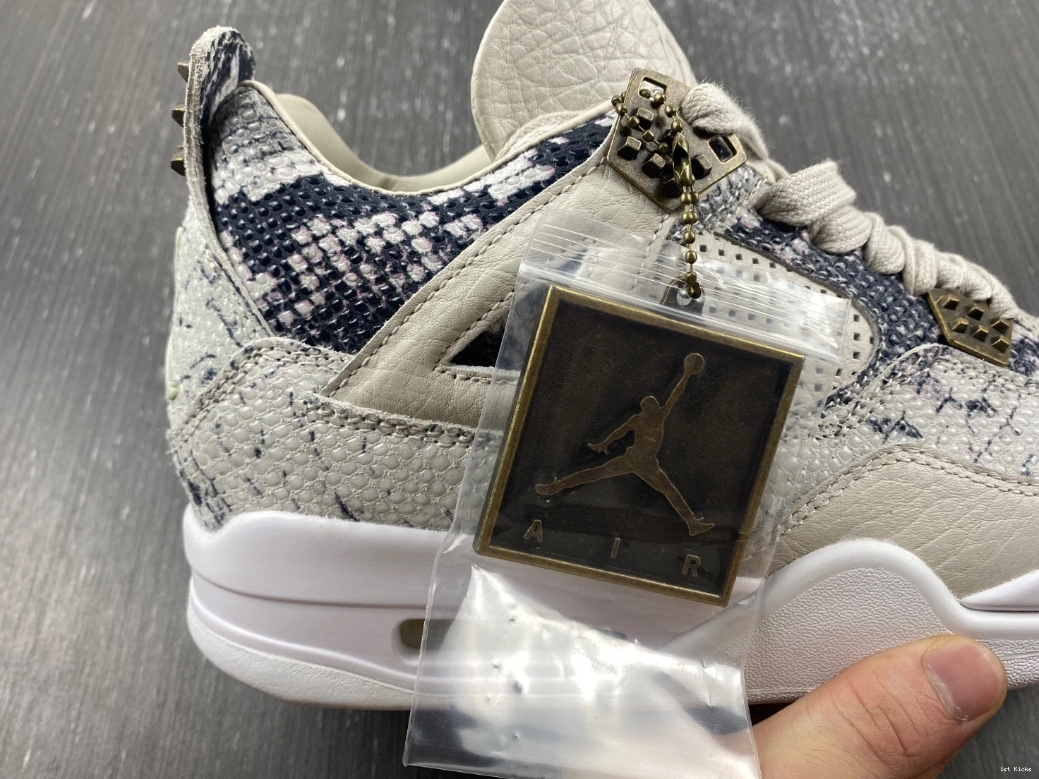 - 819139-030 Retro Snakeskin Jordan 4 1225